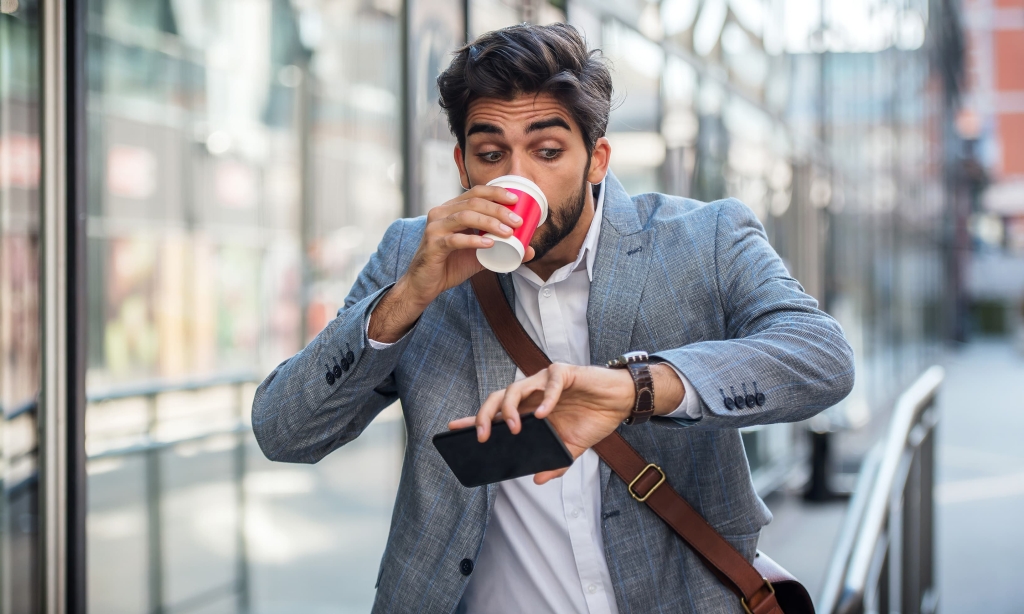Image of a man multi-tasking