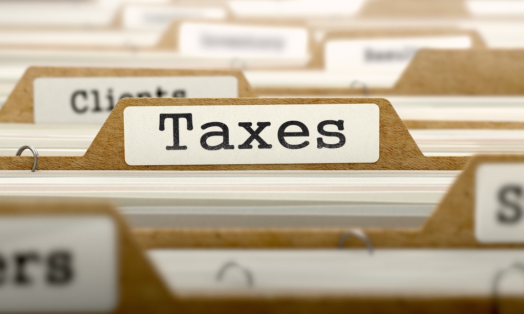 Image of a file with the word taxes on it