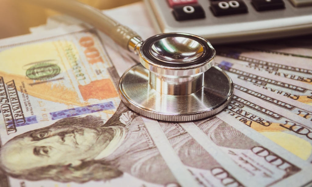 Money and a stethoscope
